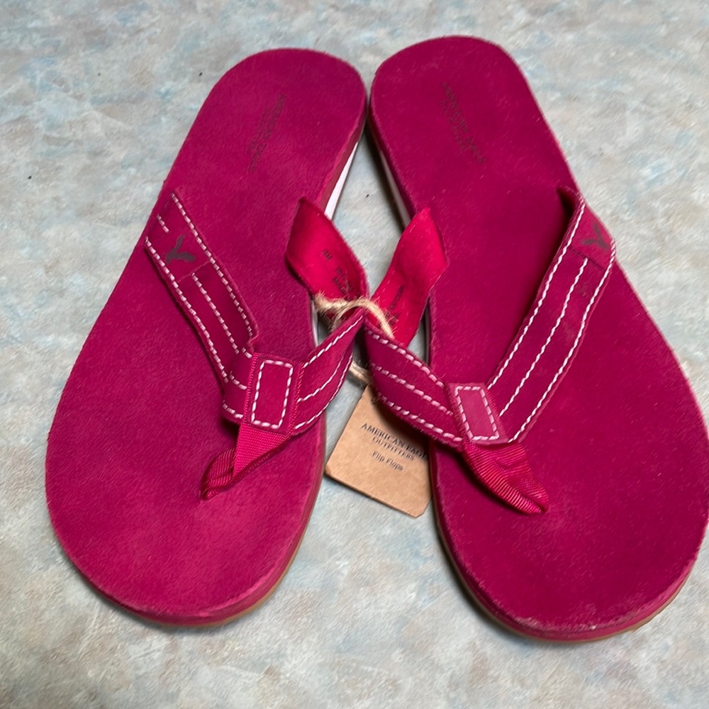 American eagle outfitters pink flip flops (sz 9)